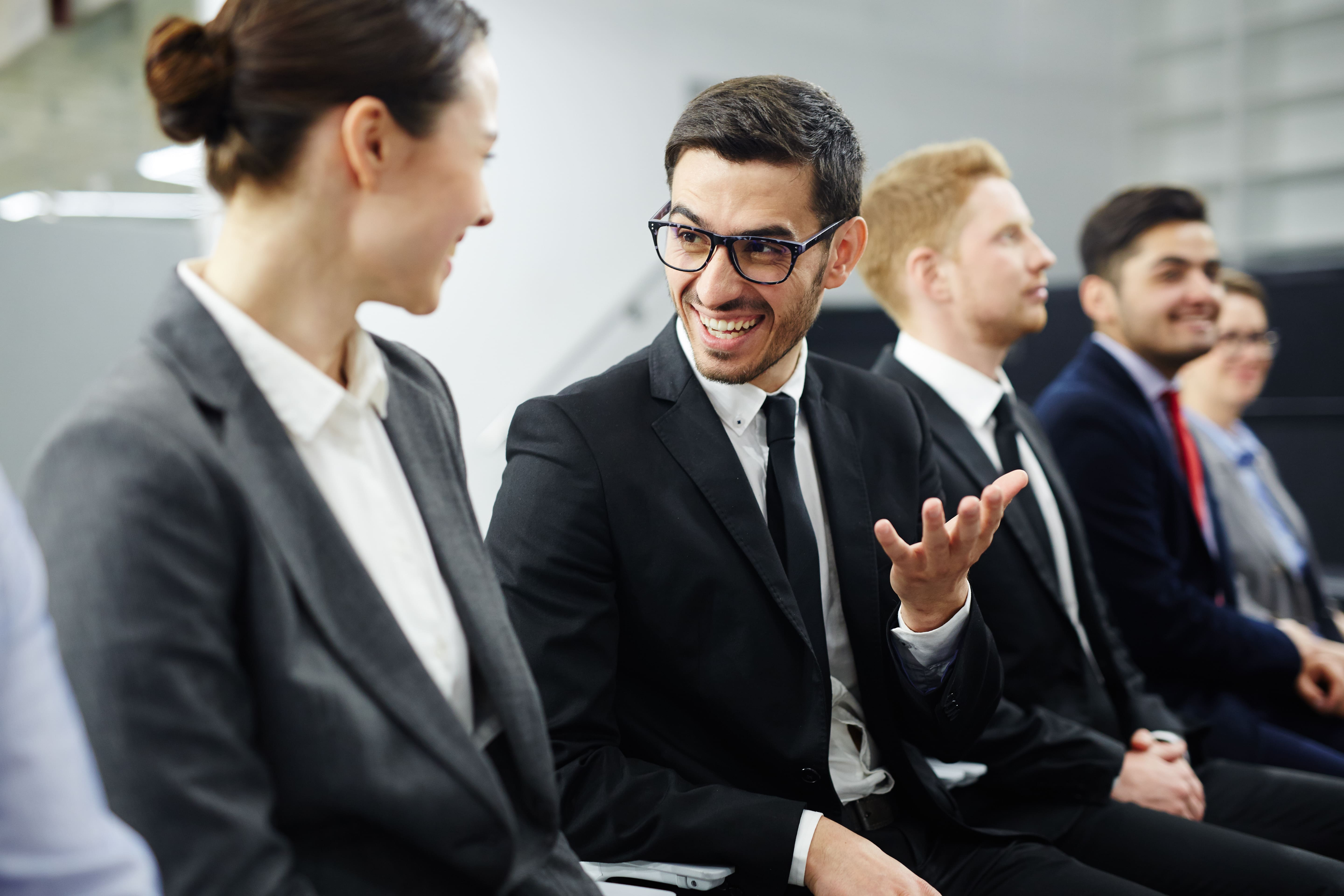 Two Corporate people discussing Systems Integrator Platforms