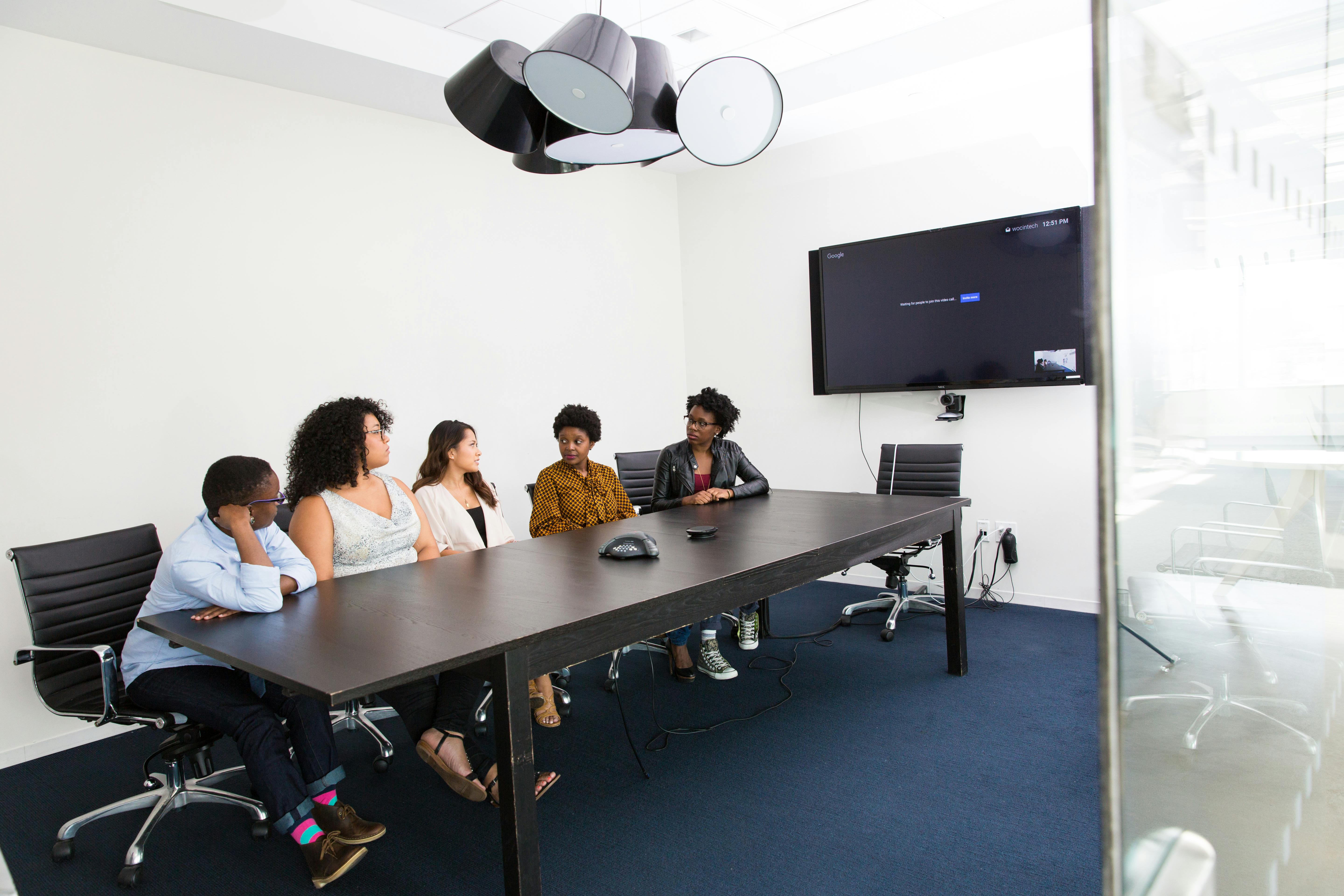 A group of People Consulting about Independent Professionals or Teams
